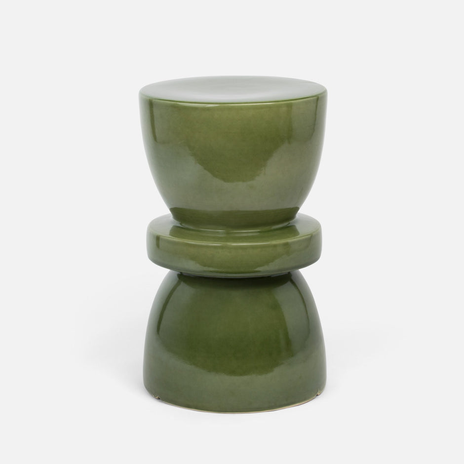 Made Goods Binx Stool as a soft blue side table with a sleek, modern design, ideal for contemporary living spaces.