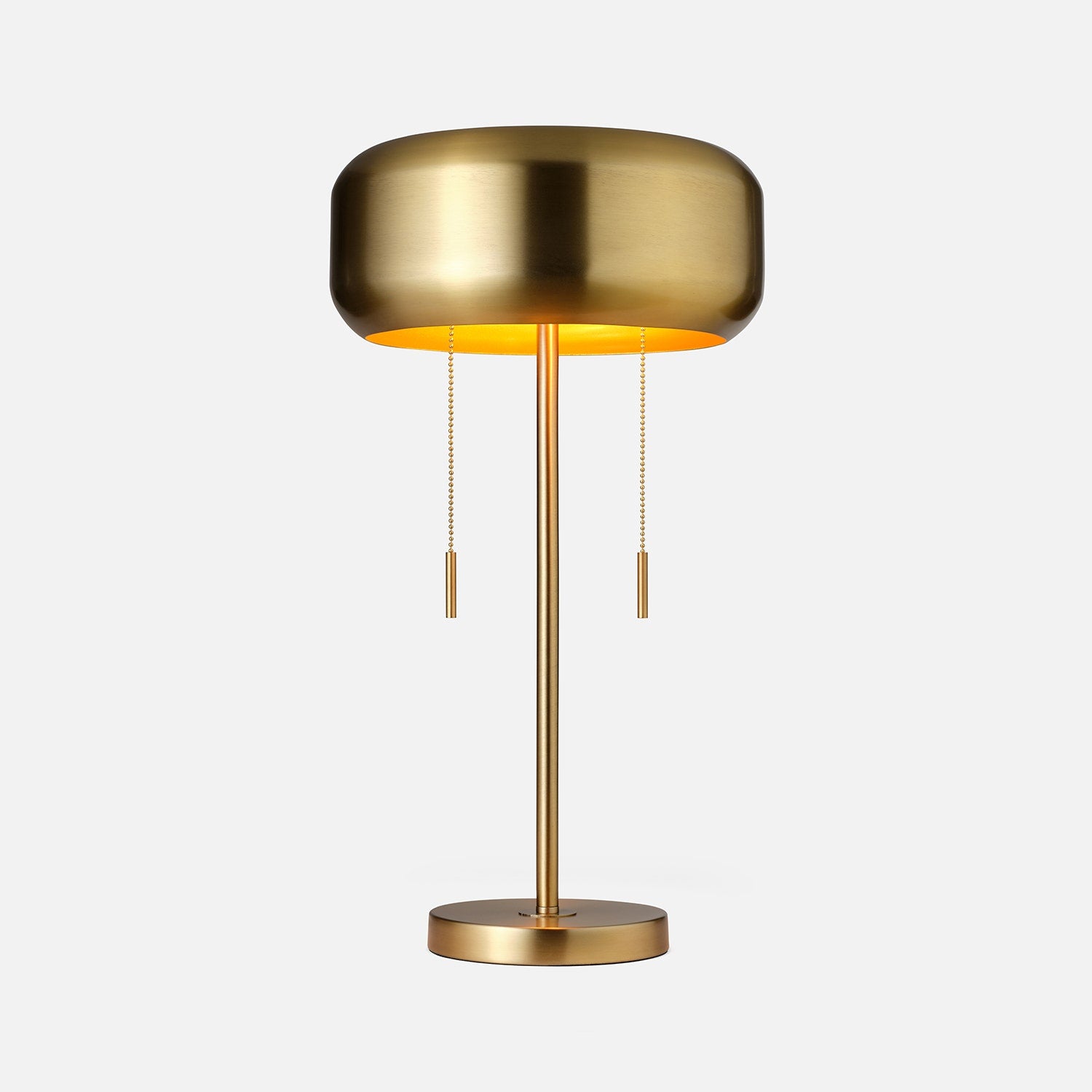 Made Goods Makoa task table lamp with a sleek design, featuring a modern metal base and adjustable arm.