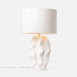 Made Goods Bethany table lamp with matte white finish, modern design, and sleek cylindrical shape.