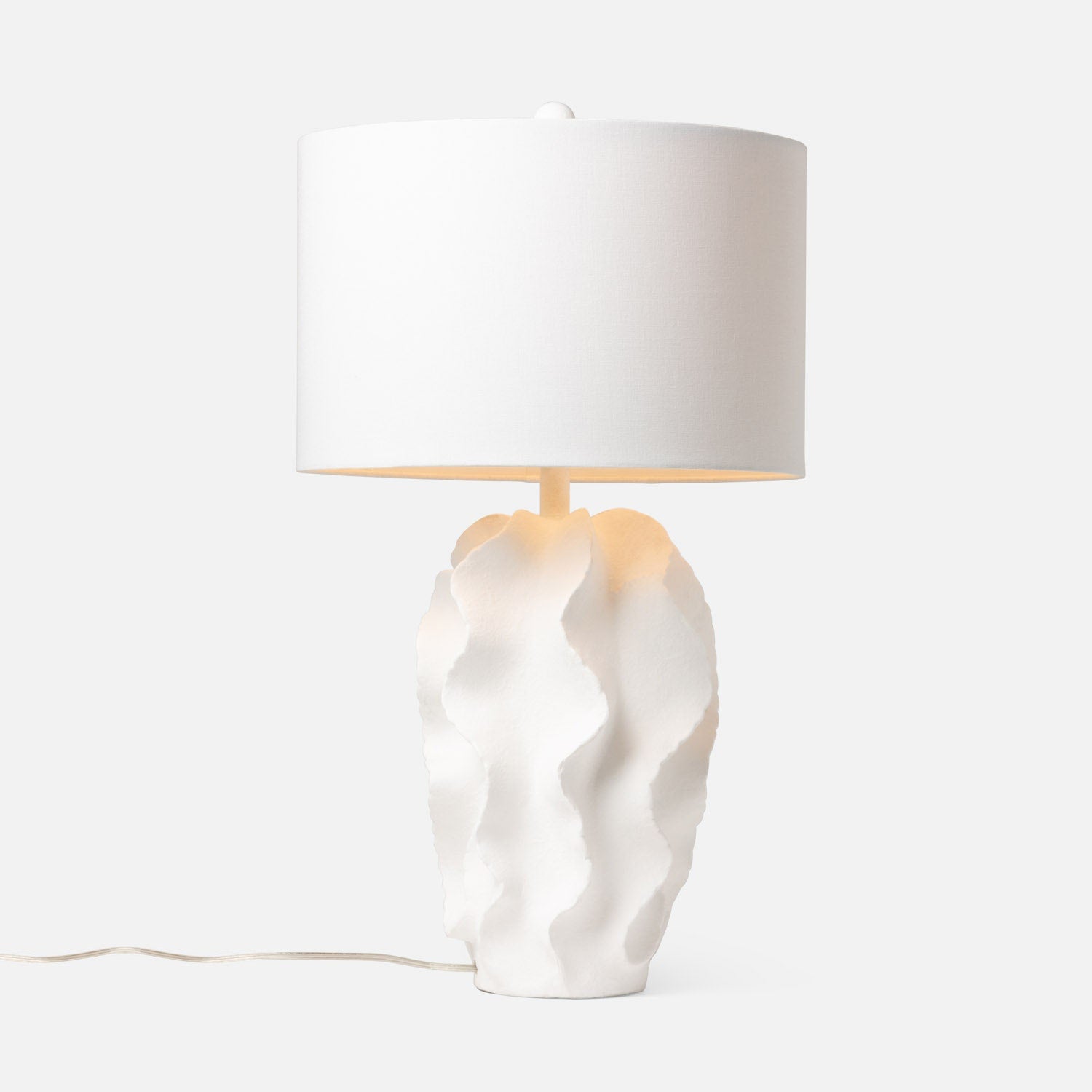 Made Goods Bethany table lamp with matte white finish, modern design, and sleek cylindrical shape.