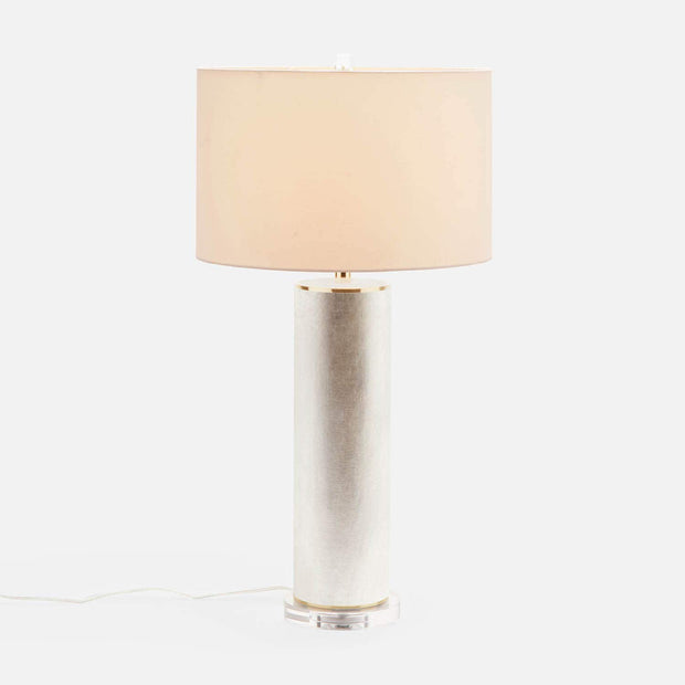 Made Goods Tavis Table Lamp with warm silver finish, featuring a sleek modern design and a cylindrical lampshade.