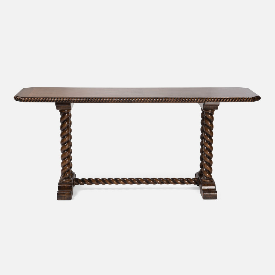 Wooden console table with twisted legs on a white background