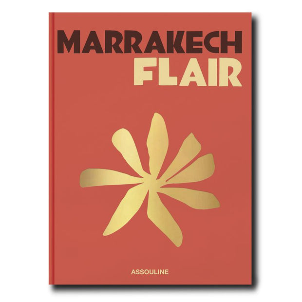Book cover of 'Marrakech Flair' with gold floral design on a red background