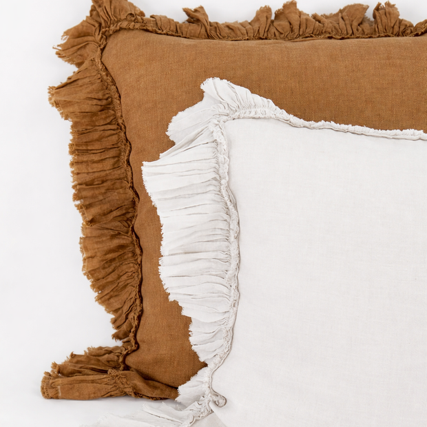 Matteo Tat Linen Euro Sham in clay color featuring textured linen fabric and decorative piping for a stylish bedroom accent.