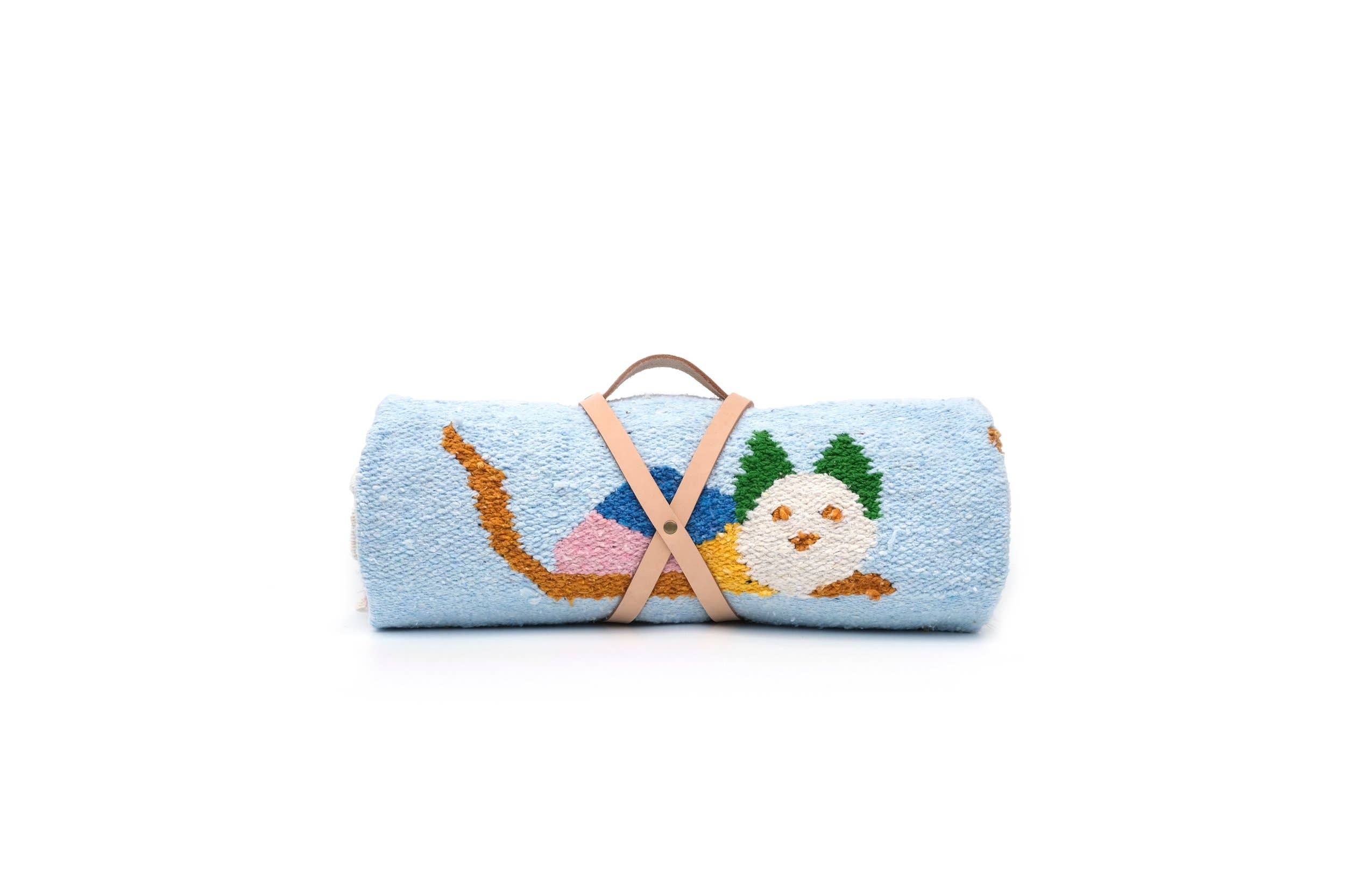 Roll of blue fabric with embroidered design on a white background