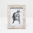 Pigeon & Poodle Aurora frame holding a 4x6 photo, featuring a sleek, modern design in a stylish finish.