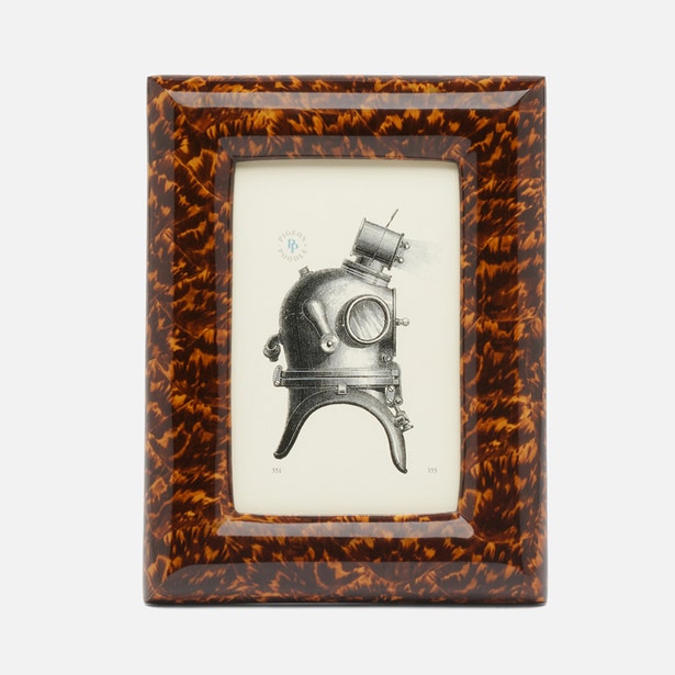 Pigeon & Poodle Dana Frame in faux tortoise material, 4x6 inch photo frame with classic tortoise design and sturdy construction.