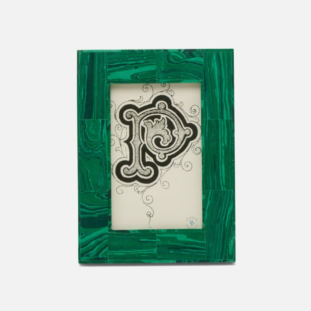 Pigeon & Poodle Olten frame holding a 4x6 photo, made of sleek black material with a modern design.