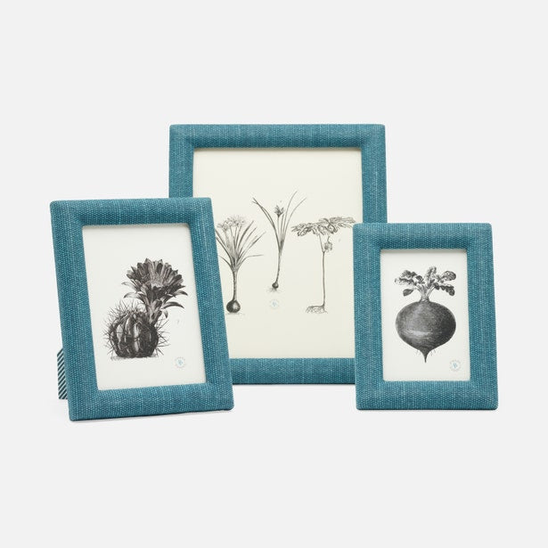 Dark green Pigeon & Poodle Kemi cotton jute frame holding a 4x6 photo, featuring natural textured material and stylish design.