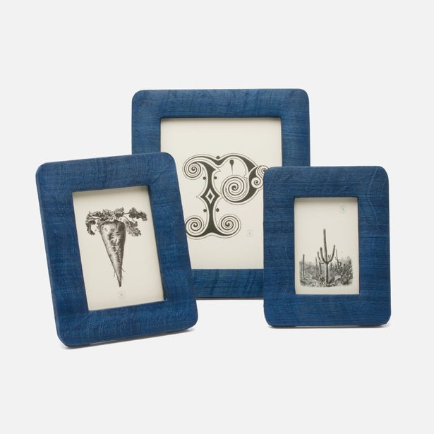 Navy Pigeon & Poodle Halle frame holding a 4x6 photo, featuring a stylish design with the brand name on the frame.