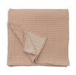 Amber Pom Pom at Home Vancouver Coverlet blanket with pom pom detailing, showcasing a cozy, stylish bedspread in a warm tone.
