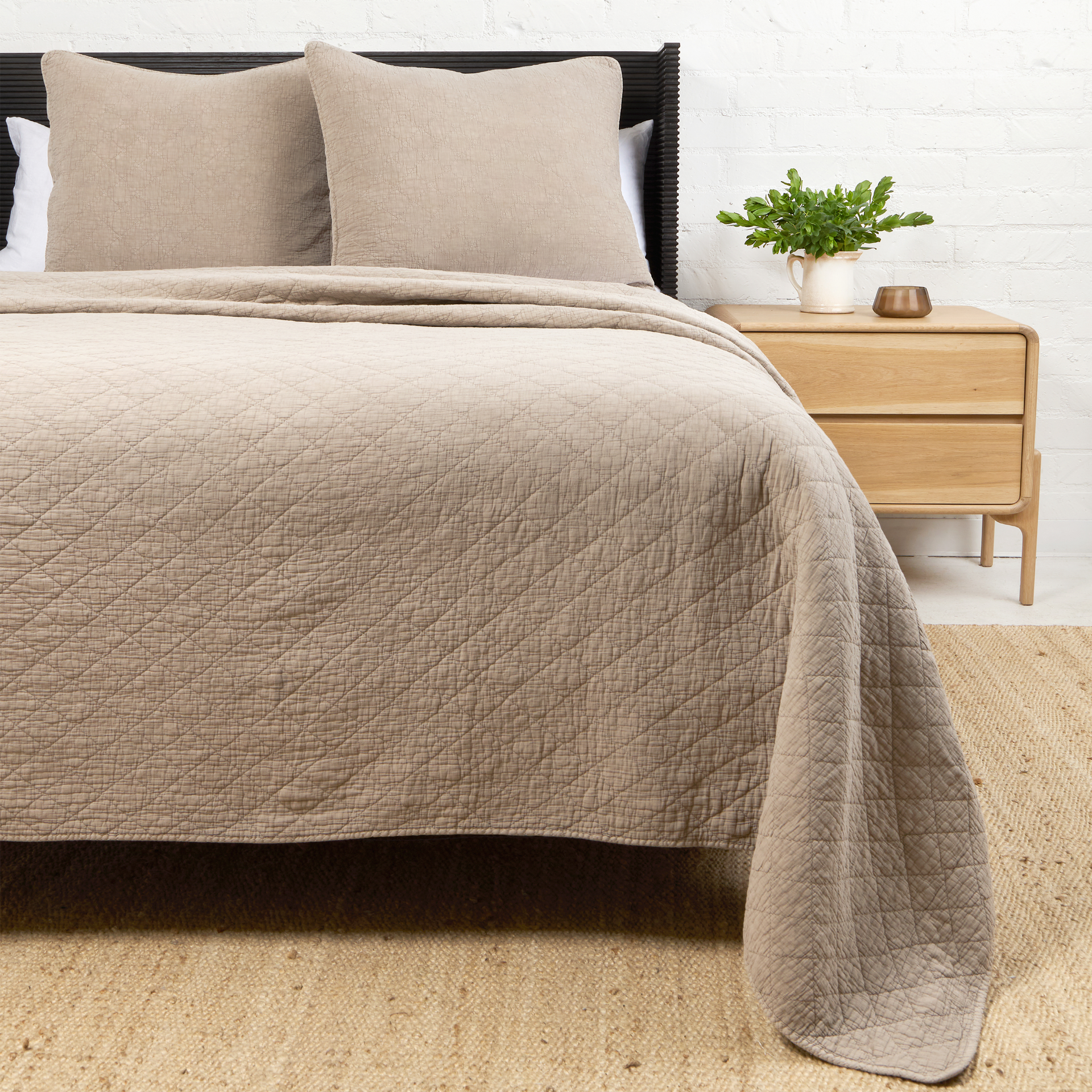 Pom Pom at Home Huntington Coverlet in midnight, showing soft fabric and decorative pom pom trim for a cozy bedroom decor.