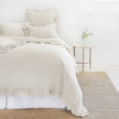 King size Pom Pom at Home Charlie duvet cover in flax with pom-pom detailing, showcasing its soft fabric and stylish design.