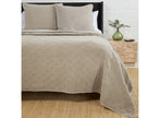 Pom Pom at Home Brussels coverlet with woven texture and neutral tones, showcasing its cozy, decorative bedding design.