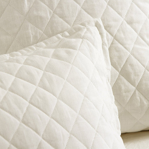 Cream Pom Pom at Home Hampton Sham for king size bed, soft fabric with decorative pom pom edging, stylish and cozy bedroom decor.