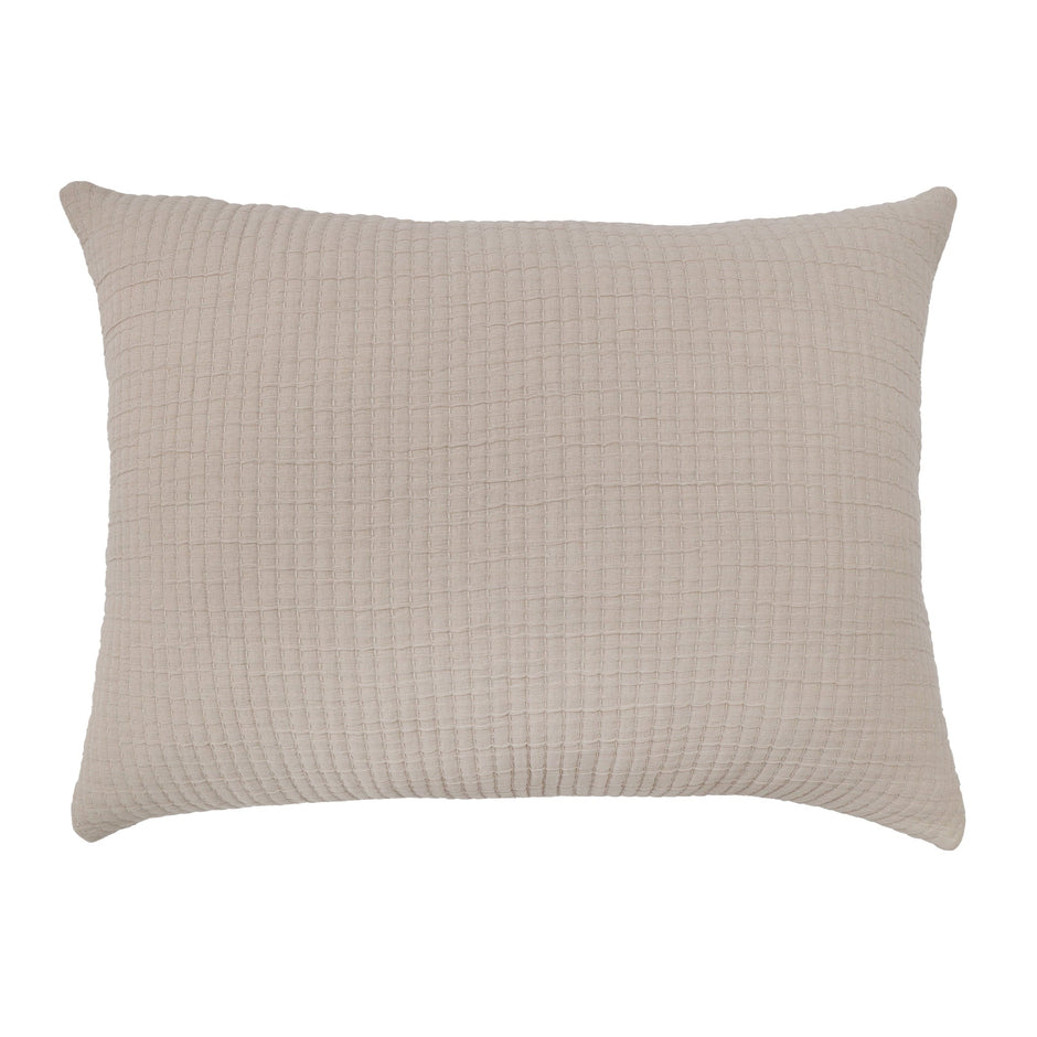Natural King-sized Pom Pom at Home Vancouver Sham with soft fabric and decorative pom-pom trim, showcasing cozy, stylish bedding.