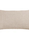 Navy Pom Pom at Home Logan Sham on a bed, showing soft fabric and decorative pom pom trim for a cozy bedroom decor.