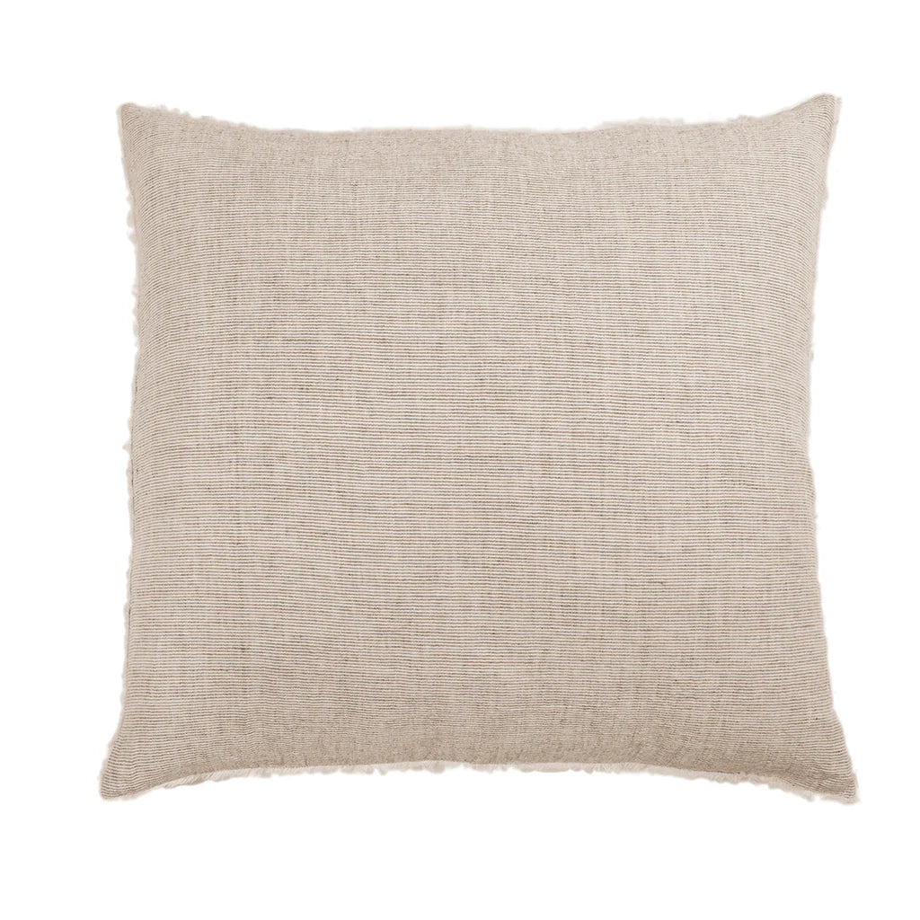 Navy Pom Pom at Home Logan Sham on a bed, features soft fabric with playful pom pom trim, king size decorative pillow sham
