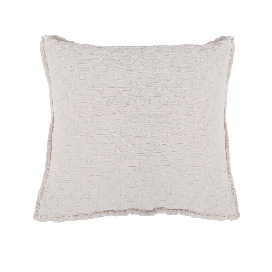 White Pom Pom at Home Ojai Matelasse Euro Sham with textured fabric and decorative pom pom edging for a cozy, stylish look.