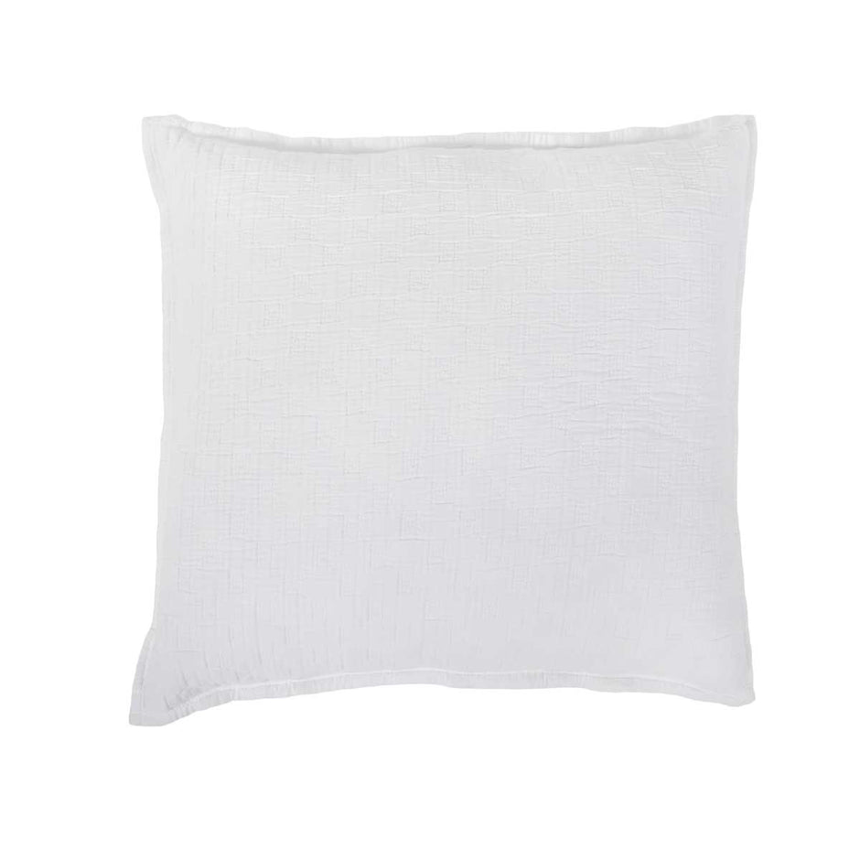 White Pom Pom at Home Ojai Matelasse Euro Sham featuring intricate matelasse quilting and decorative pom pom trim.
