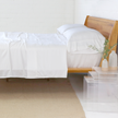 Pom Pom at Home Parker bamboo twin sheet set in white with soft, breathable fabric and a smooth, cozy texture.
