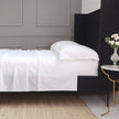 Pom Pom at Home Audrey ruffle cotton percale sheet set with elegant ruffle details on a king-size bed.
