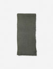 Taupe linen throw blanket from Pom Pom at Home with decorative pom-pom accents, cozy and stylish for living room or bedroom.