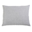 Navy throw pillow from Pom Pom at Home Logan collection with plush fabric and decorative pom pom accents.