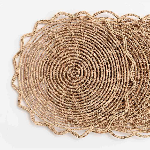 Set of four bamboo cane placemats by Pomegranate, natural woven table linens for dining decor.