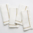 Set of four India Hicks linen napkins from Pomegranate, elegant table linens with a soft, natural fabric design.