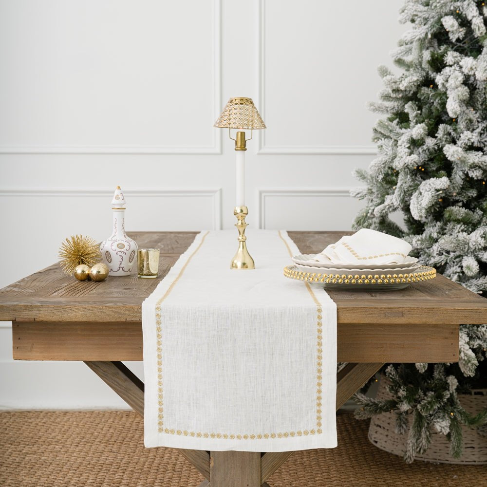 India Hicks linen table runner from Pomegranate featuring elegant, natural-colored linen fabric for sophisticated table decor.