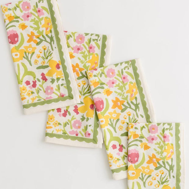 Pomegranate 70's Flower napkin, part of table linens collection, featuring vibrant floral pattern on soft fabric.