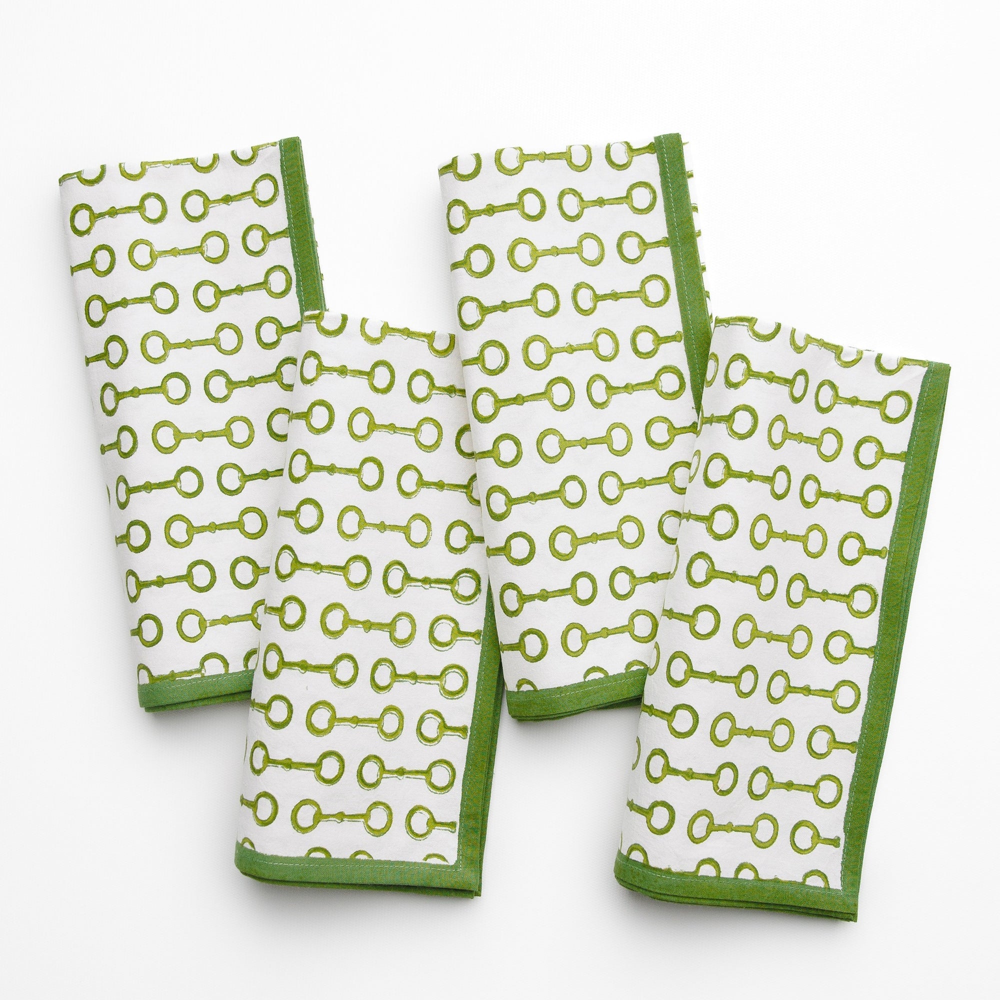 Set of four green Pony Club napkins by Pomegranate, made of soft table linens for casual or special occasions.