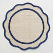 Dark blue rice paper placemat from Pomegranate, a stylish table linen with intricate paper design for dining decor.