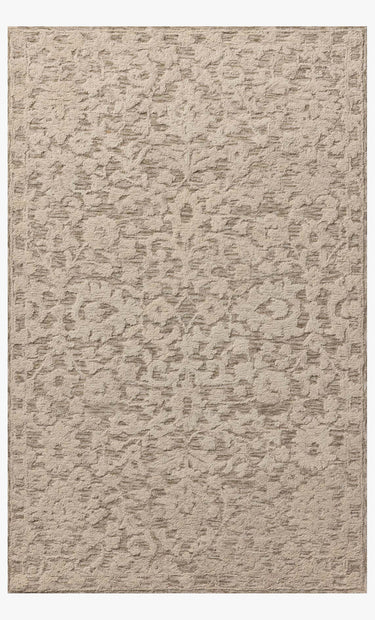 Textured beige rug with a subtle pattern on a white background