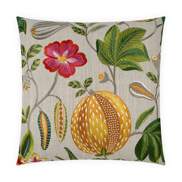 Decorative pillow with floral and fruit embroidered design on a beige background
