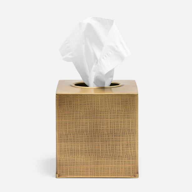 Tissue box with woven design on a white background