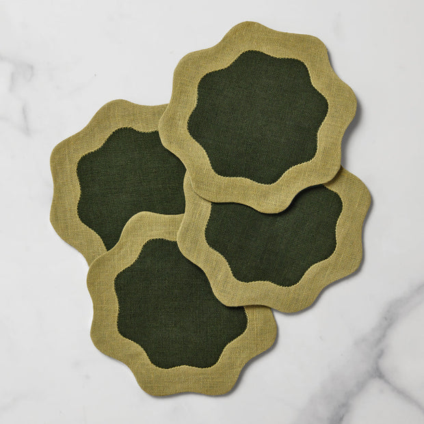 Set of six Sferra Ondulato cocktail napkins in forest celadon with elegant wave pattern, perfect for upscale gatherings.