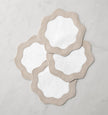 Set of six Sferra Ondulato cocktail napkins in forest celadon, featuring elegant wave design, perfect for upscale gatherings.
