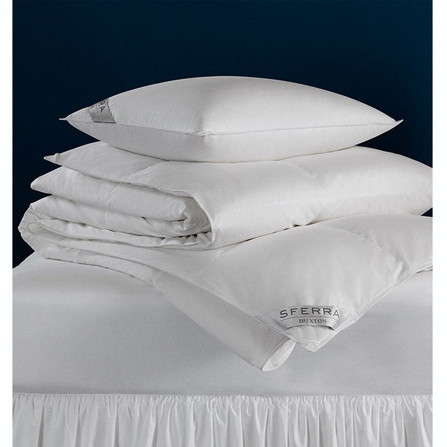 Light Sferra Buxton queen duvet insert shown, plush and breathable bedding layer for comfortable sleep.