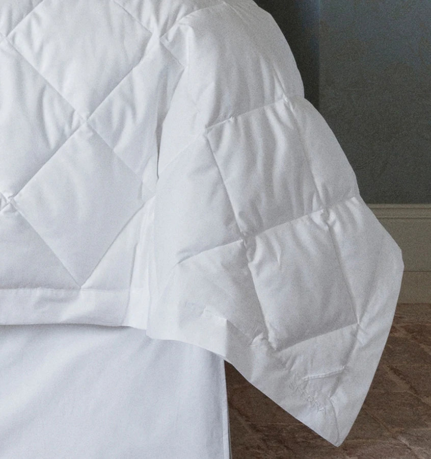 Queen-sized Sferra Tilney duvet insert with plush, soft fabric and high-quality filling for cozy comfort.
