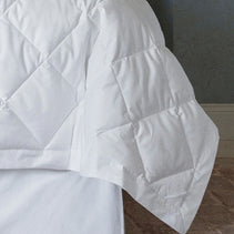 Queen-sized Sferra Tilney duvet insert with plush, soft fabric and high-quality filling for cozy comfort.