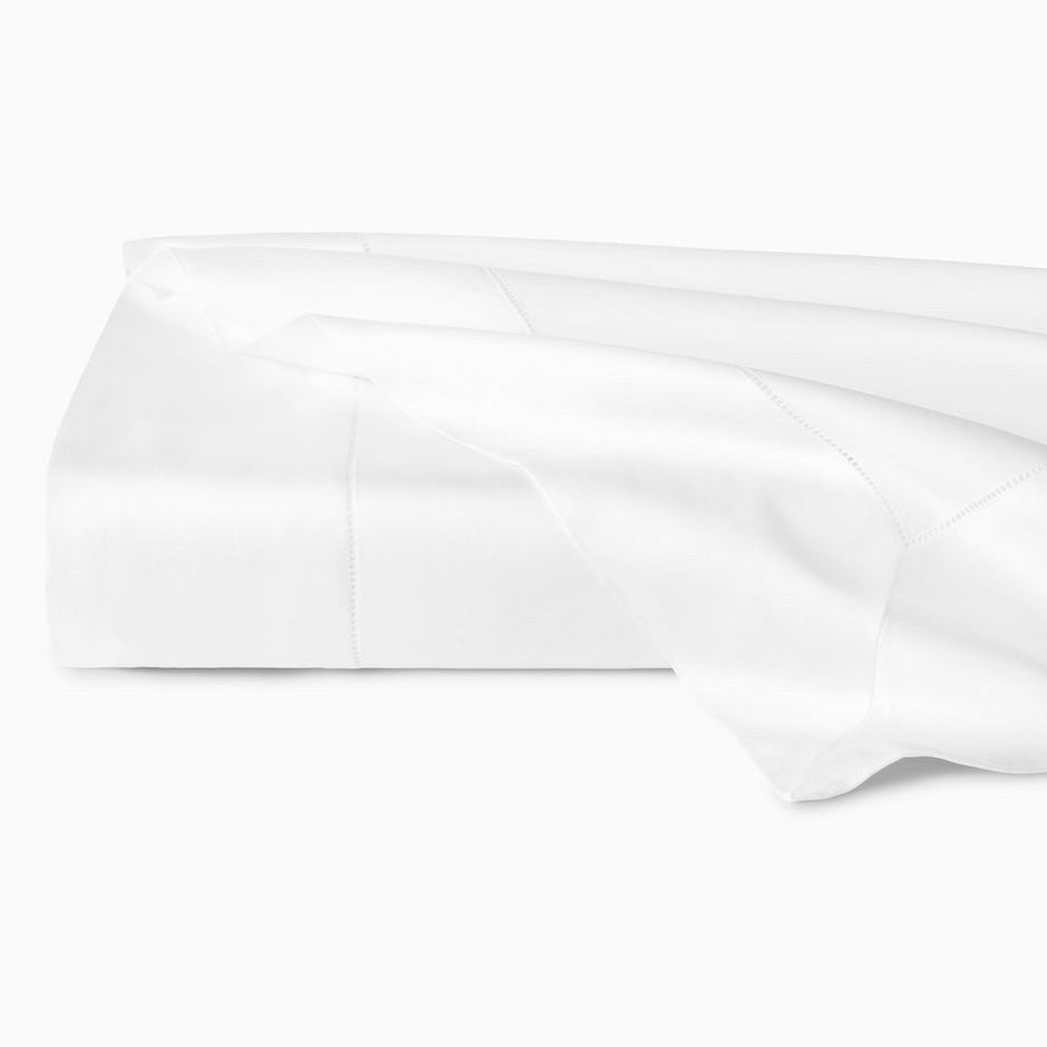 White Sferra Giza 45 Sateen King Flat Sheet, soft and smooth bedding made from luxurious Egyptian cotton.