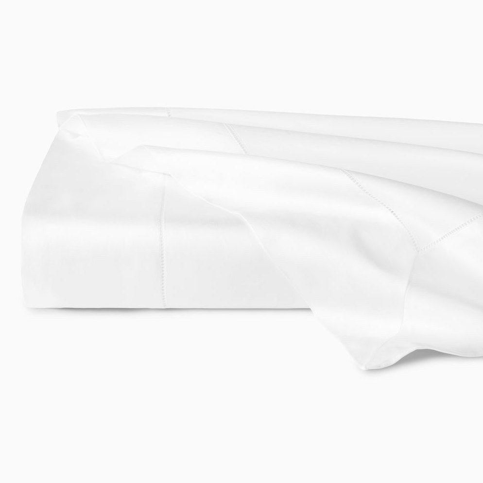 White Sferra Giza 45 Sateen King Flat Sheet, soft and smooth bedding made from luxurious Egyptian cotton.