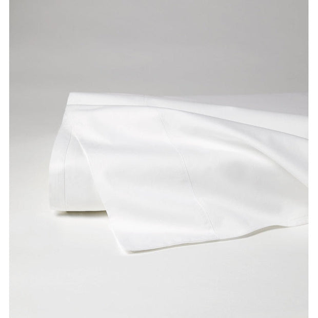 White Sferra Celeste flat sheet for queen size bed, soft and smooth fabric with neatly folded edges.