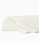 White Sferra Celeste flat sheet for queen bed, soft and smooth luxury linen fabric, shown spread neatly on a bed.