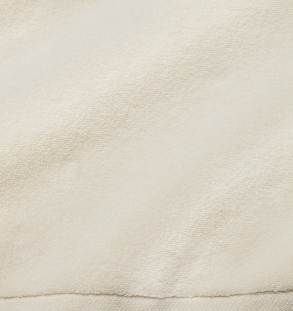 Ivory Sferra Cielo hand towel with soft, plush fabric and elegant texture, ideal for bathroom or guest use.