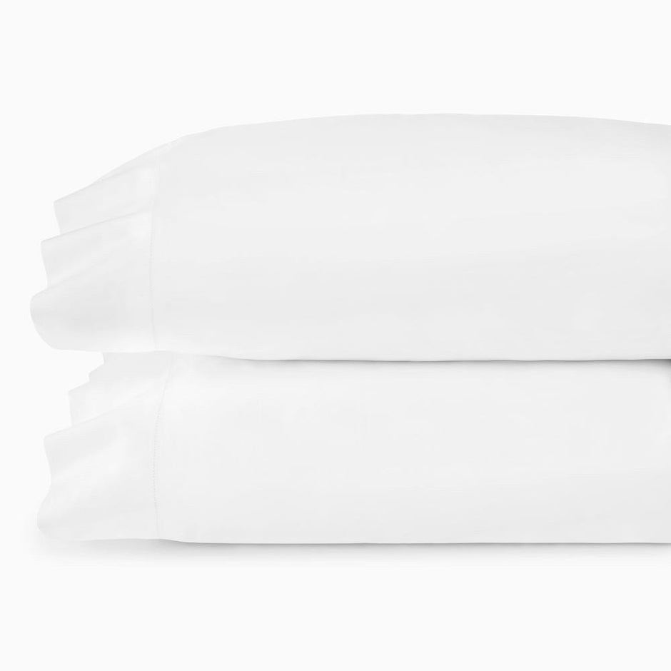 Pair of white Sferra Giza 45 Percale pillowcases, standard size, made from soft, breathable percale fabric for luxurious comfort.