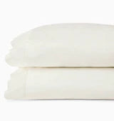 Pair of white Sferra Celeste pillowcases, standard size, made from soft, high-quality fabric for a luxurious sleep experience.