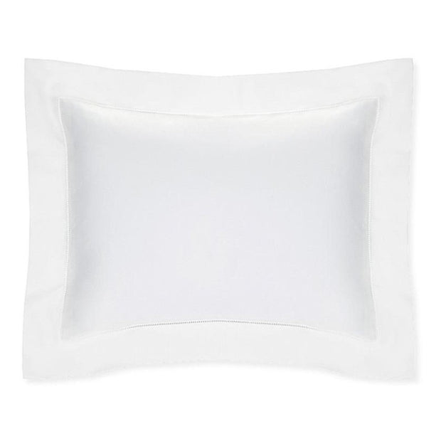 White Sferra Celeste sham pillow cover with a smooth, elegant design for a luxurious bedroom decor.